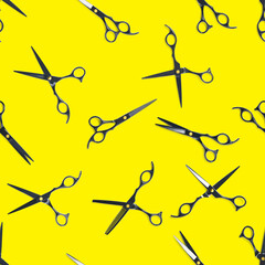 Seamless pattern of black scissors. professional hairdresser black scissors isolated on yellow. Black barber scissors, close up. pop art background, for prints or posters