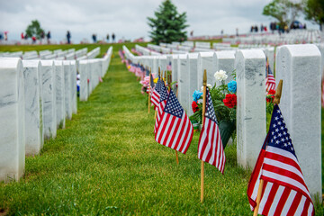 american flags on a grave