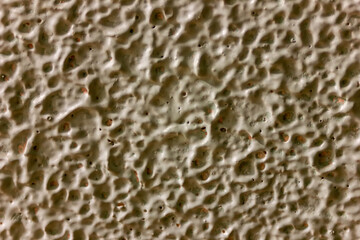 The structure of the concrete wall is very similar to the lunar surface.