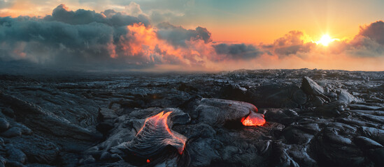 Lava Field under sunset clouds on background