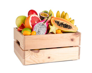 Wooden crate with different exotic fruits on white background