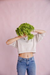 person holding broccoli