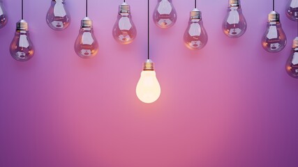 Hanging light bulbs on purple background with one illuminated and space for text	
