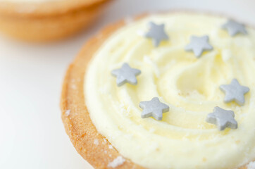 All-butter pastry pies with a mincemeat filling with spiced vine fruits, topped with brandy buttercream and a sweet dusting