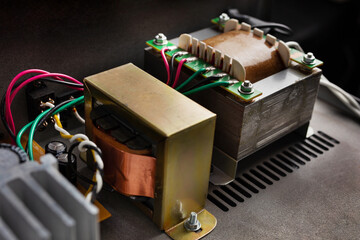 Electric power supply transformers in the amplifier. Power inductor transformer coil