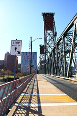 Portland, City of Bridges: Hawthorne Bridge pedestrian crossing and bicycle lane.
