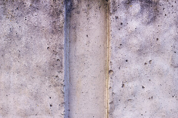 Grey textured concrete wall background.