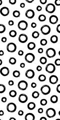 Black and white seamless pattern with rings in brush stroke technique. Abstract background with hand painted circles.