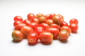 Cherry tomatoes fruits isolated on white background. clipping path, full depth of field.