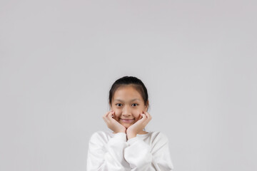 Asian girl studio portrait on gray background