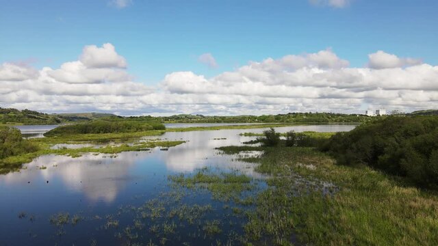 Liftoff near the banks of river Lee in County Cork, Ireland on a a sunny day.