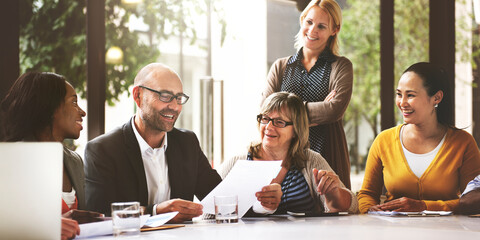 People in a meeting at a table