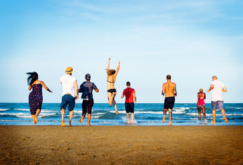 Fototapeta na wymiar Group of diverse friends at a beach
