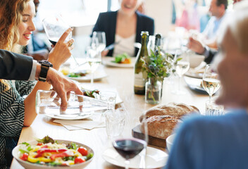 Group of diverse people are having lunch together