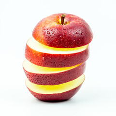 Red apple sliced with water droplets isolated on white background.