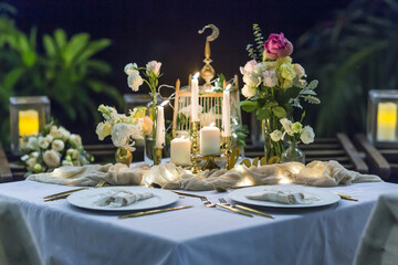Romantic Wedding Table Top Layout Table Spread no people tropical location with gold cutlery at night evening event