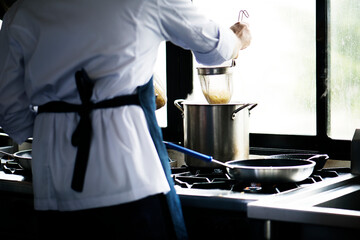 Chef cooking spaghetti