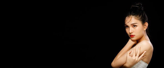 Naklejka premium Portrait of 20s Asian LGBTQIA+ Woman black hair white vast dress