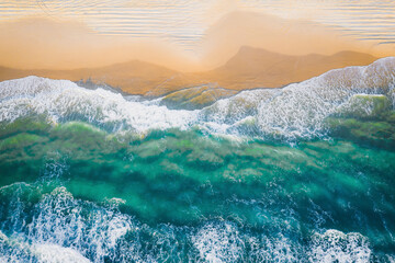 Naklejka na ściany i meble Beautiful coastline with clear sea water drone photograph