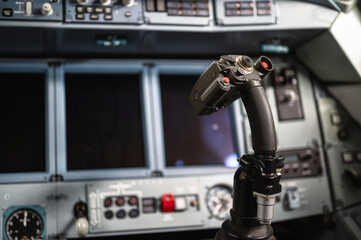 Airplane control stick. The cockpit of a jet aircraft