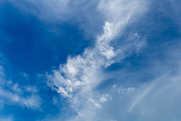 Naklejka na ściany i meble WIspy clouds and blue sky suitable for background