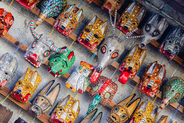Carved wooden masks in a market in Guatemala
