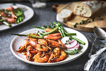 Garlic and Herby Prawn with Sautéed Asparagus, Baby Carrot and Snap pea