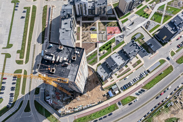 tower crane on the construction of a new high-rise residential building. birds eyes view