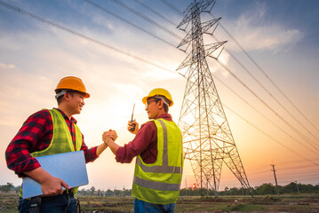 electrical engineer working at the power station See the planning of electricity production at high...