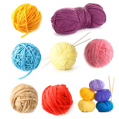 Set of knitting yarns and needles on white background