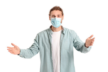 Young man in medical mask opening arms for hug on white background