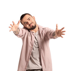 Fototapeta premium Young man opening arms for hug on white background