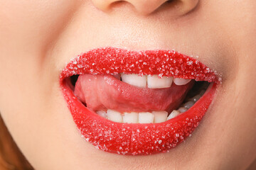 Beautiful young woman with sugar lips, closeup