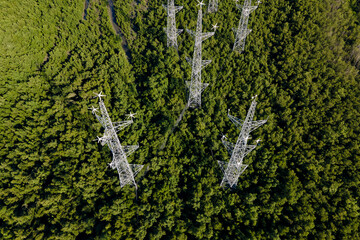 Wind turbines in green forest,  Clean energy renewable energy and environment.