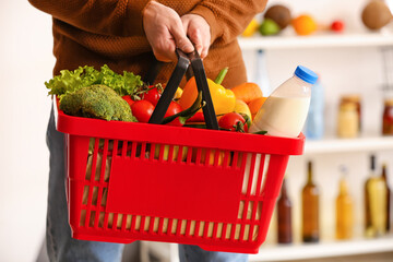 Man buying food in supermarket