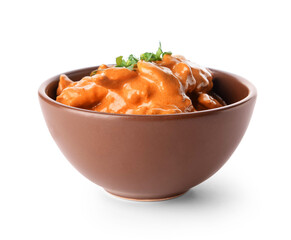 Bowl of tasty chicken tikka masala on white background