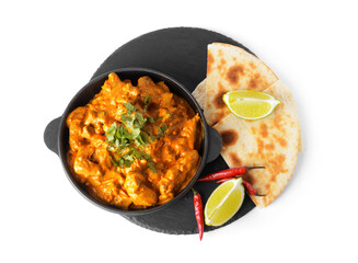 Frying pan of tasty chicken tikka masala on white background