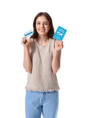Young woman with International Certificate of Vaccination and immune passport on white background