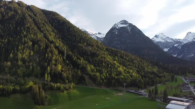 Pertisau village and its old skilift going to the peak of a mountain. Cloudy day in Alps in Austria, Tyrol.