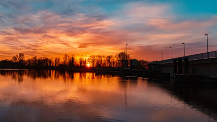 Beautiful sunset with reflections near Plattling, Isar, Bavaria, Germany