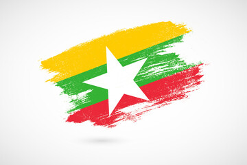 Fototapeta premium Happy independence day of Myanmar with vintage style brush flag background