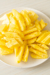 Fototapeta na wymiar fresh pineapple sliced on plate