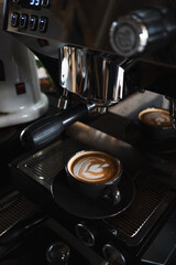 Cup of cappuccino on a wooden table, close up 