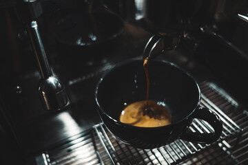 Cup of cappuccino on a wooden table, close up 