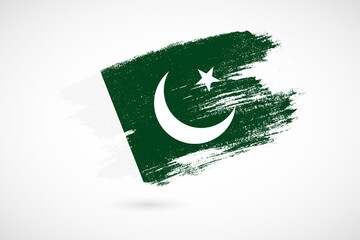 Happy independence day of Pakistan with vintage style brush flag background