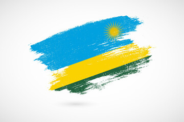 Happy independence day of Rwanda with vintage style brush flag background