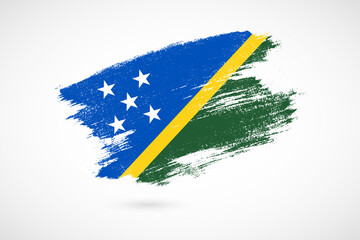 Happy independence day of Solomon Islands with vintage style brush flag background