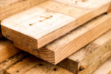 Closeup of stack of wooden planks