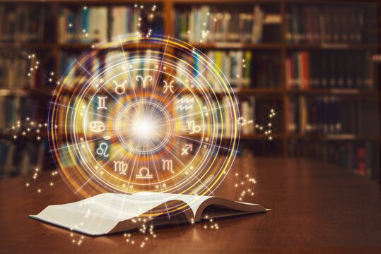 Horoscope astrology, Zodiac sign and constellation study for foretell and fortune telling education course concept with horoscopic wheel over old book in school library.