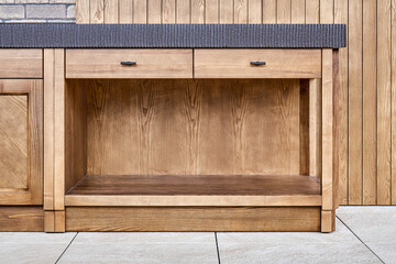 Furniture set of veneer and solid ash timber with acrylic solid surface countertop with figure edge in summer kitchen on open terrace